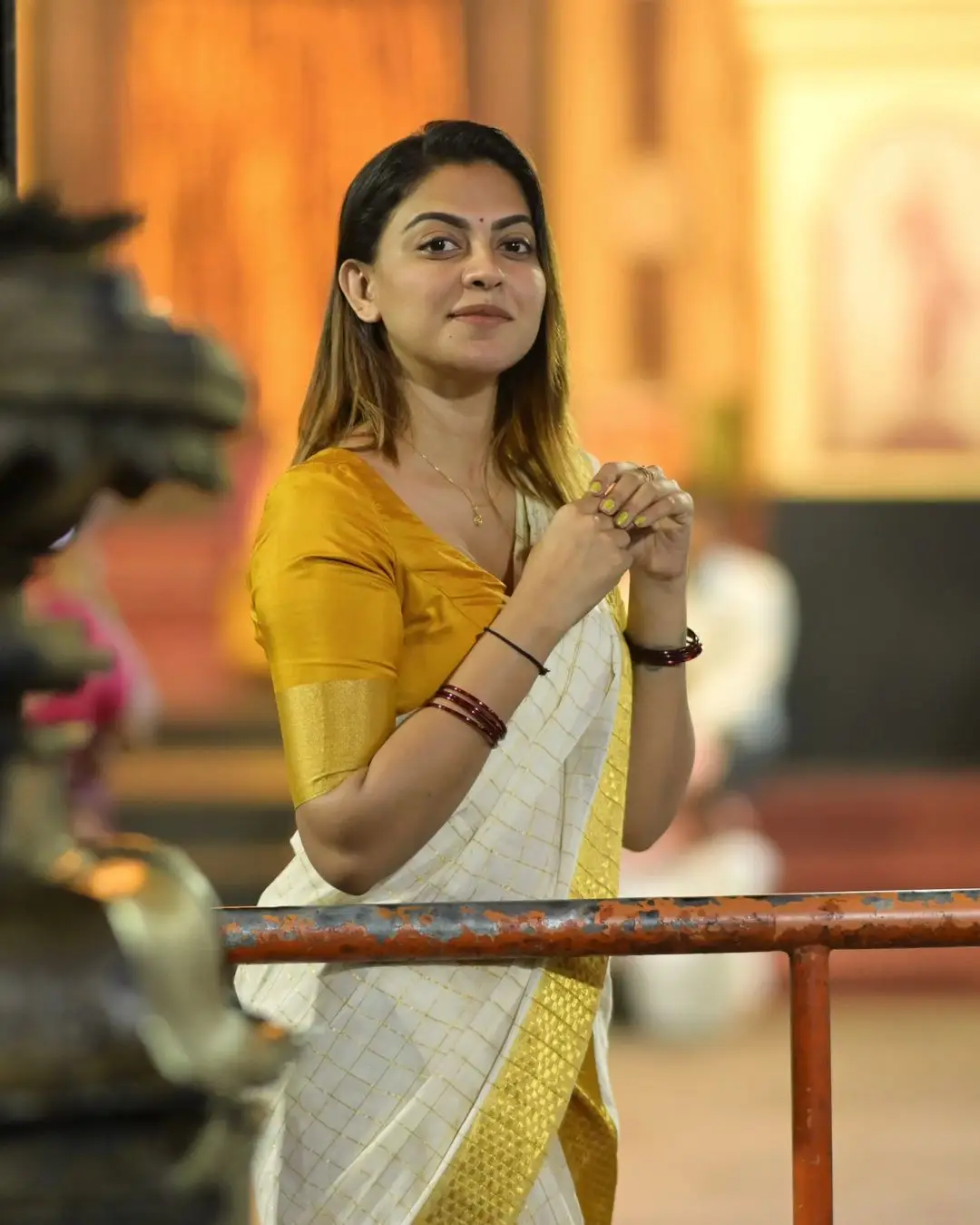 Anusree Nair Wearing Beautiful Earrings Jewellery White Saree Yellow Blouse